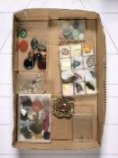 A small quantity of minerals and polished semi precious stones, brooch, etc.