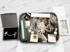 A collection of costume jewellery, some silver items, wristwatches,