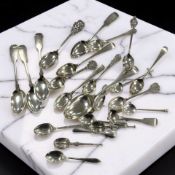 Assorted Georgian and later silver dessert, tea, and caddy spoons,
