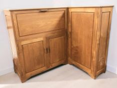 A 20th century oriental camphor wood corner cocktail cabinet, 120 cm L x 100 cm W x 107 cm H.