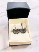 A pair of silver and 18ct gold earrings,