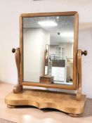 An early 20th century walnut swing dressing table mirror, width 58 cm.
