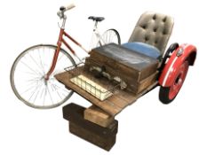 A vintage Universal bike, together with a non-functioning 'side car'.