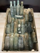 A collection of antique glass bottles.