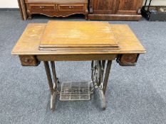 A Singer treadle sewing machine,