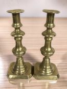 A pair of Victorian brass candlesticks, height 24 cm.