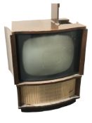 A mid-20th century TV in walnut cabinet, width 64 cm.