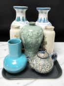 A modern pair of Chinese baluster vases, a further modern celadon glaze vase, a further pair,