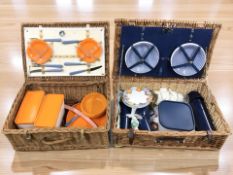 Two vintage picnic sets in wicker hampers