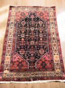 A Hamadan rug, North-West Iran, 212 cm x 135 cm.