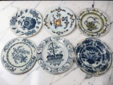 Six 18th century Delft plates, diameter 23 cm.