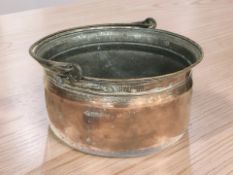 A 19th century copper plated swing handled cooking pot, diameter 39 cm.