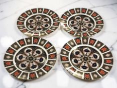 A set of four Royal Crown Derby Old Imari cabinet plates, pattern 1128, date code LVII,