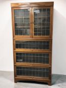 A 20th century walnut and leaded glass stacking bookcase, 87 cm x 29 cm x 181 cm.