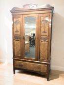 An Art Nouveau burr walnut mirrored door wardrobe, 125 cm x 49 cm x 217 cm,