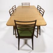 A teak extending rectangular dining table with leaf, overall 196 cm x 86 cm x 73 cm,
