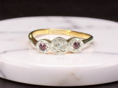 A ruby and diamond ring, stamped 18ct Plat, size M CONDITION REPORT: 2.1g.