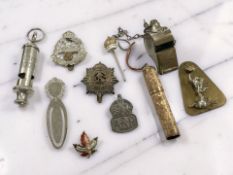 A silver ARP badge plus several other military badges, an ARP whistle by J Hudson & Co, Birmingham,