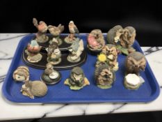 A collection of bird and hedgehog ornaments including Royal Doulton.