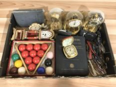 A set of snooker balls, three clocks under domes, travel timepiece, various pairs of glasses,