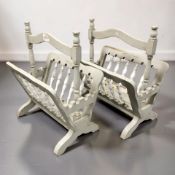 A pair of painted magazine racks.