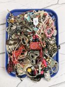 A large quantity of costume jewellery, necklaces, beads, etc.