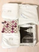 A large quantity of new cushion covers including London skyline, polkadot.