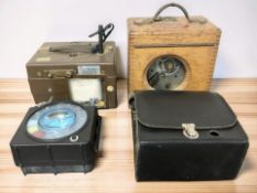 Three pigeon timing clocks.