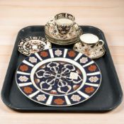 A Royale Poltel imari plate and assorted imari tea china including a Royal Crown Derby cup and