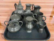 A collection of 18th / 19th century pewter tankards and other vessels.