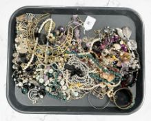 A quantity of costume jewellery, beads, necklaces, etc.