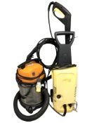 A Karcher pressure washer and a wet and dry vacuum.