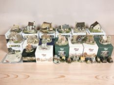 A collection of Lilyput Lane and Memory Lane cottage ornament,