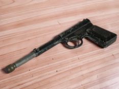 A vintage Gat air pistol.