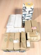 A large quantity of polythene bags, rolls of tape, etc.