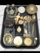 A group of brass wares, pewter cruet, cutlery, Japanese carved bone figures,