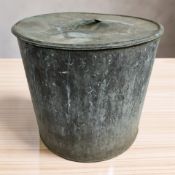 A galvanised twin handled tub with lid, height 39 cm.