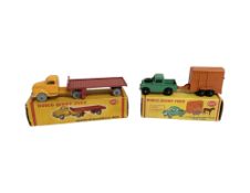 Two Dublo Dinky Toys die cast vehicles : 072 Bedford Articulated Flat Truck and 073 Land Rover and