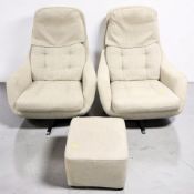 A 20th century four piece lounge suite comprising of a pair of swivel armchairs,