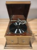 A walnut table gramophone.