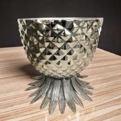 A large silvered ceramic punch bowl in the form of a pineapple, height 41 cm.