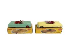 Two Dinky Toys die cast vehicles : 131 Cadillac Tourer and 132 Packard Convertible,