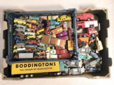 A collection of 20th century play-worn die cast vehicles including Corgi and Dinky.