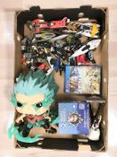 A group of modern figurines including DC super heroes, PS4 game, etc.