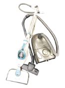 An Electrolux vacuum cleaner and a steam mop