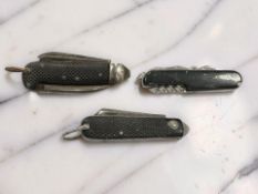 Two folding military knives,