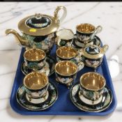 A fifteen piece Italian Capodimonte gilt tea service.