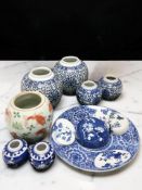 A group of Persian-style blue and white ginger jars,