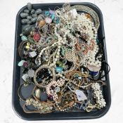 A quantity of costume jewellery, beads, necklaces, etc.