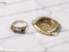 A 9ct gold ring mount and a similar watch case back CONDITION REPORT: 6.8g gross.